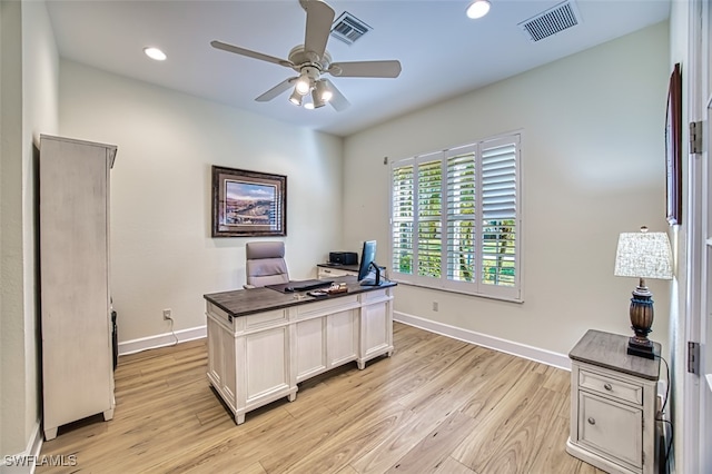 office area with ceiling fan and light hardwood / wood-style flooring