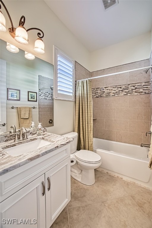 full bathroom with shower / bath combo with shower curtain, tile patterned flooring, vanity, and toilet