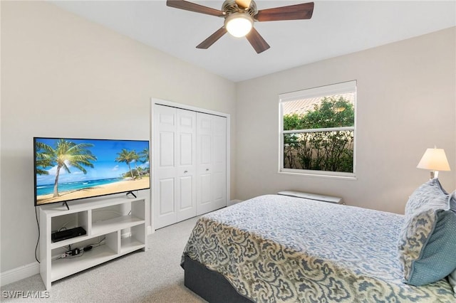 bedroom featuring carpet flooring, a closet, and ceiling fan