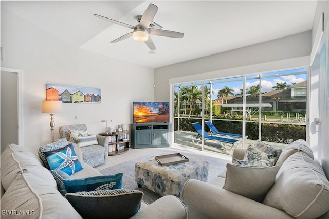 tiled living room featuring ceiling fan