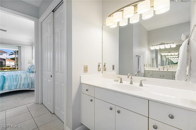 bathroom with vanity and tile patterned floors