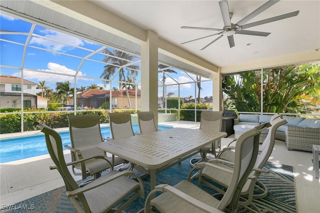 sunroom / solarium with ceiling fan