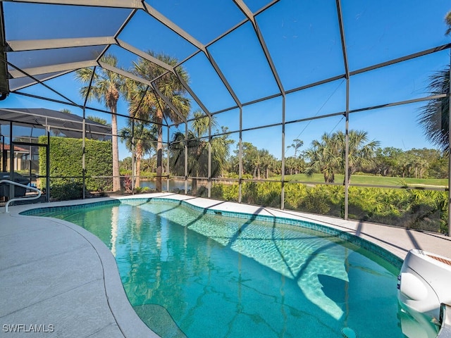 view of pool with a lanai