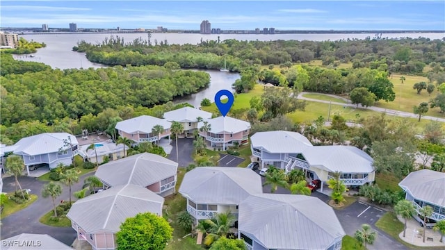 drone / aerial view with a water view