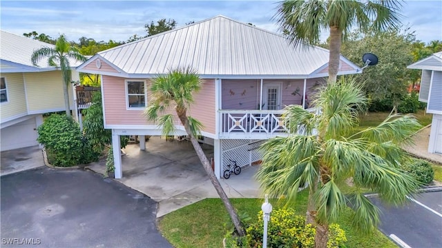 view of front of home featuring a carport