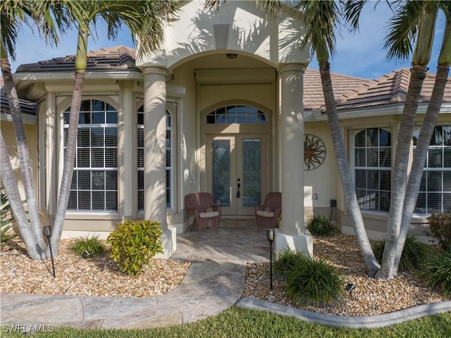 doorway to property with french doors