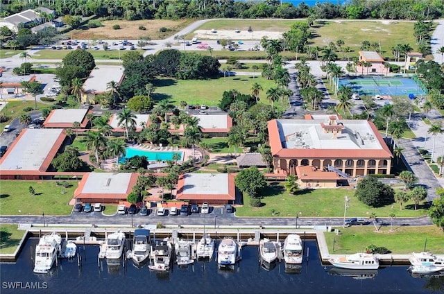 birds eye view of property featuring a water view