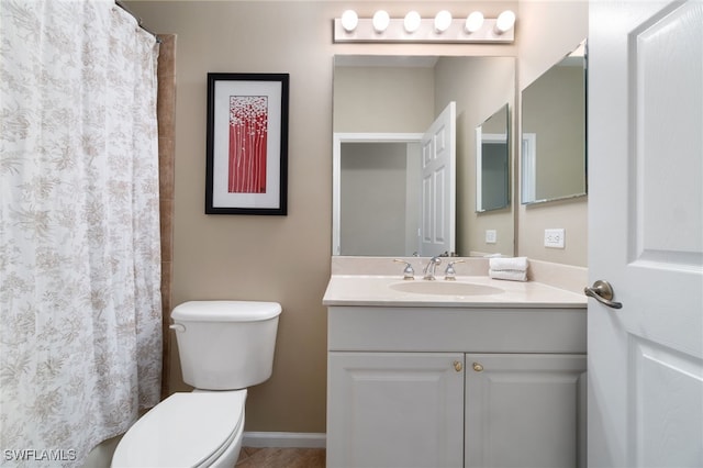 bathroom with a shower with curtain, vanity, and toilet