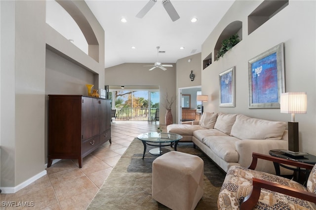 living room featuring ceiling fan, light tile patterned flooring, and high vaulted ceiling