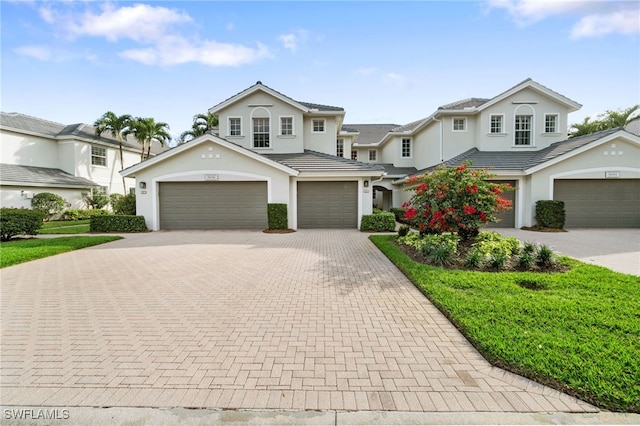 view of front of property with a garage