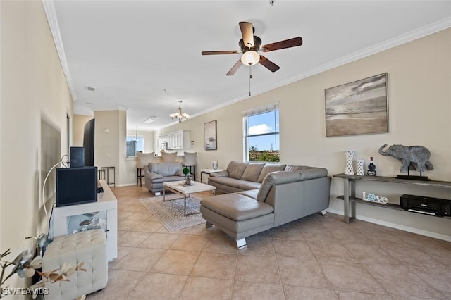 living room with light tile patterned flooring, ceiling fan with notable chandelier, and ornamental molding