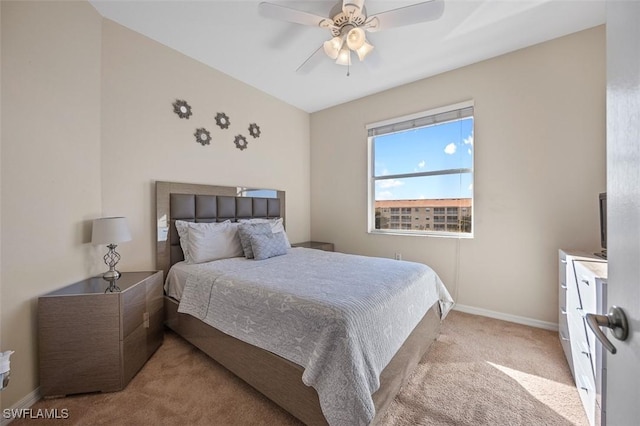 bedroom featuring ceiling fan and light colored carpet