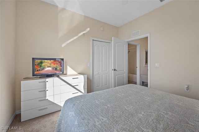 carpeted bedroom featuring a closet