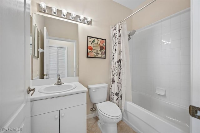 full bathroom with tile patterned flooring, shower / tub combo, vanity, and toilet