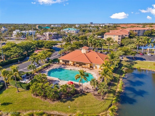 birds eye view of property featuring a water view