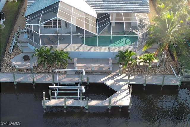 view of dock featuring a lanai