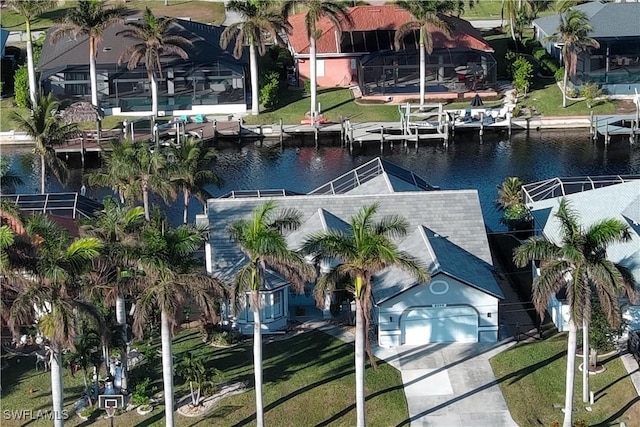 drone / aerial view with a water view