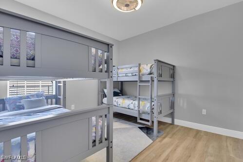 bedroom featuring wood-type flooring