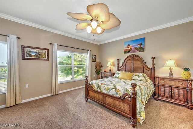 bedroom with baseboards, carpet floors, a ceiling fan, and crown molding