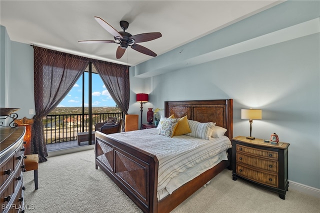 bedroom featuring ceiling fan, access to exterior, and light colored carpet