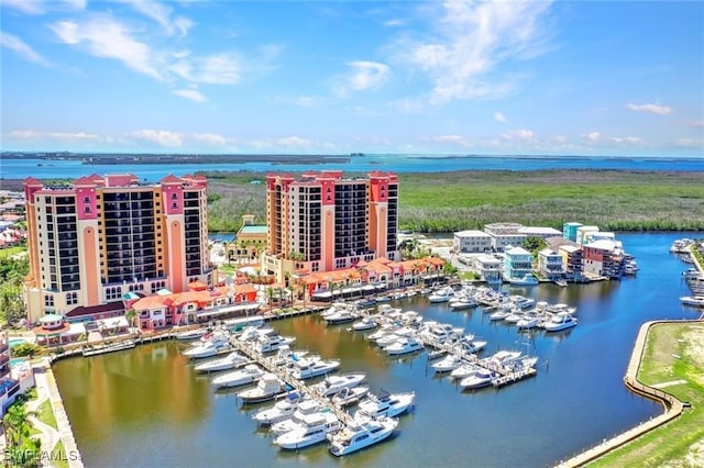 birds eye view of property with a water view