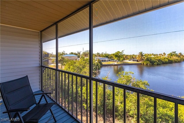 balcony featuring a water view