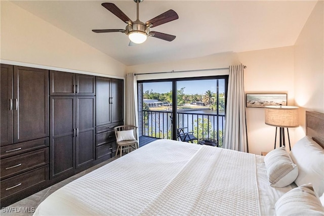 bedroom featuring ceiling fan, a water view, lofted ceiling, and access to outside