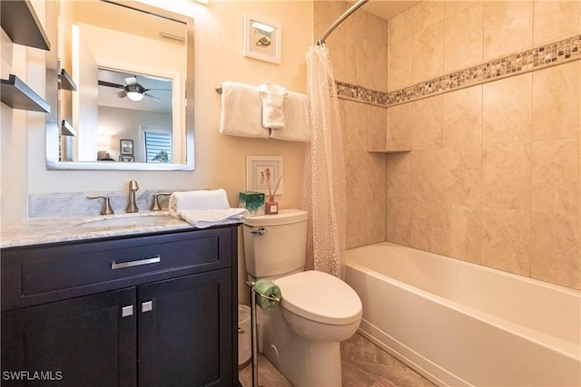 full bathroom with vanity, tile patterned floors, ceiling fan, toilet, and shower / bath combo with shower curtain