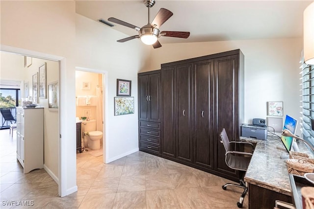 home office with ceiling fan and vaulted ceiling