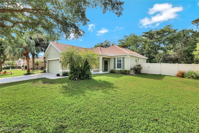 view of front facade with a front yard and a garage