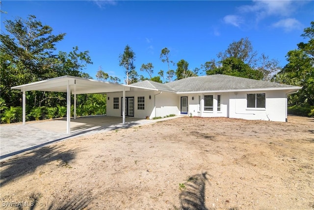 view of front of home featuring a carport