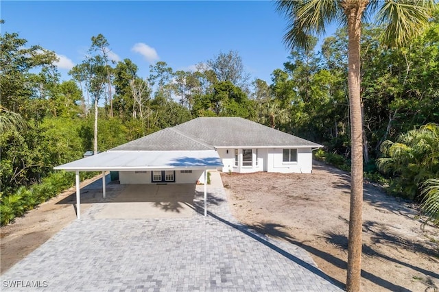 view of front of property with a carport