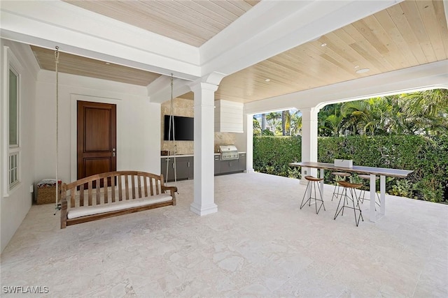 view of patio / terrace with grilling area and exterior kitchen