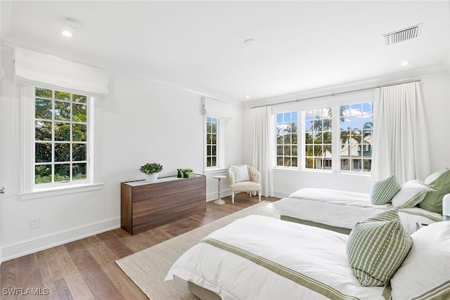 bedroom featuring hardwood / wood-style floors