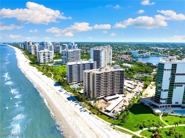 aerial view featuring a view of the beach and a water view