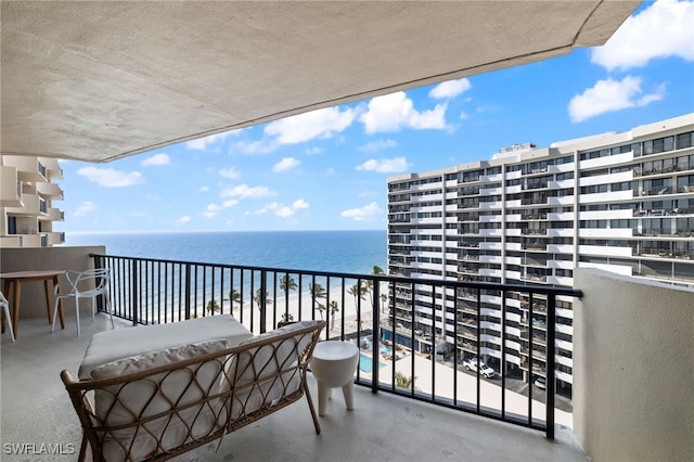 balcony featuring a water view