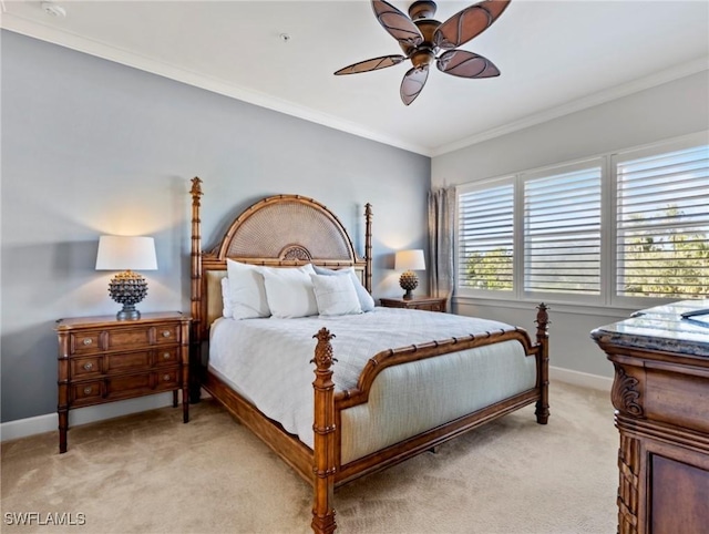 bedroom featuring light colored carpet, ceiling fan, and crown molding