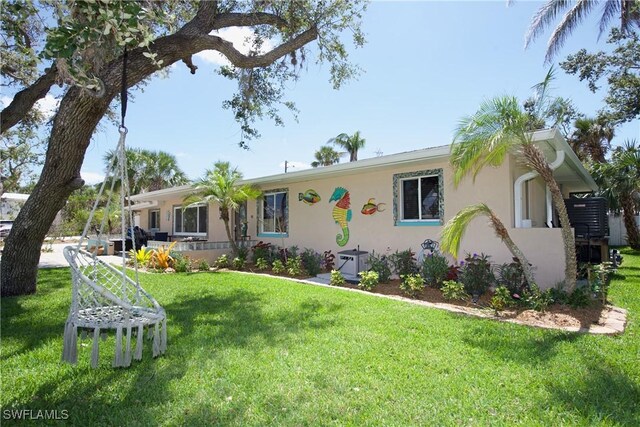 view of front of house with a front yard