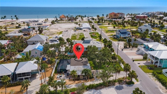 bird's eye view with a water view and a residential view