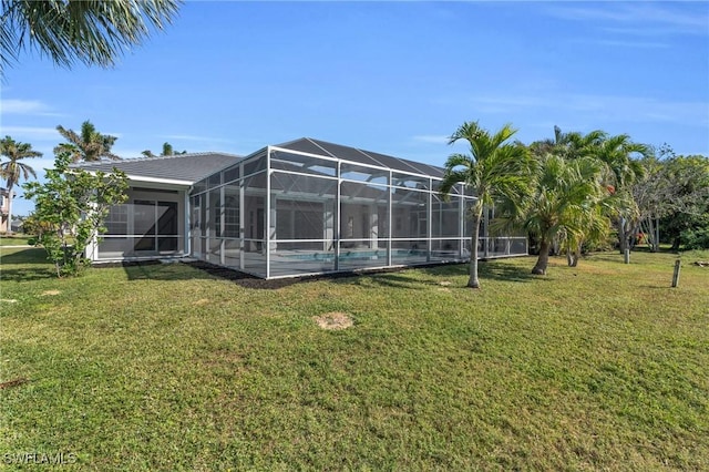 view of yard with a lanai