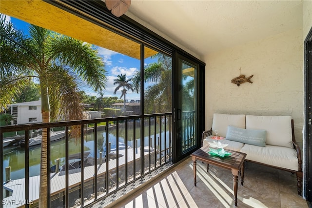 balcony featuring a water view