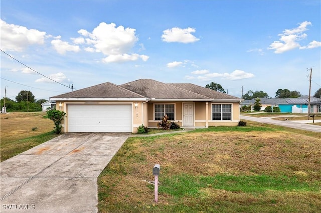 ranch-style house featuring a front yard and a garage