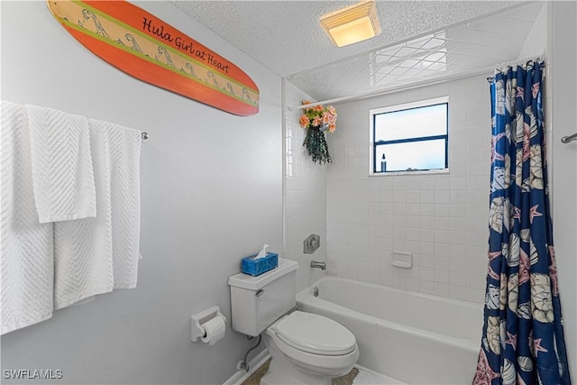 bathroom with shower / bath combination with curtain, toilet, and a textured ceiling