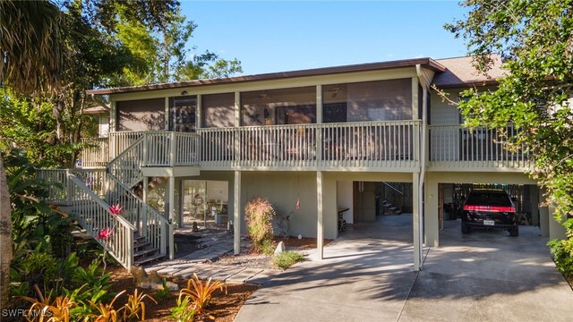 exterior space with a carport