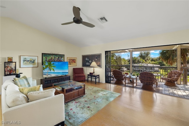 living room with light hardwood / wood-style floors, vaulted ceiling, and ceiling fan