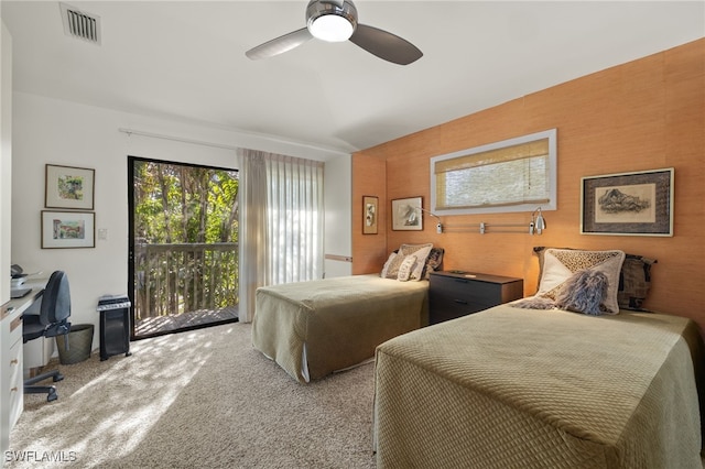 bedroom featuring ceiling fan, access to exterior, and light colored carpet