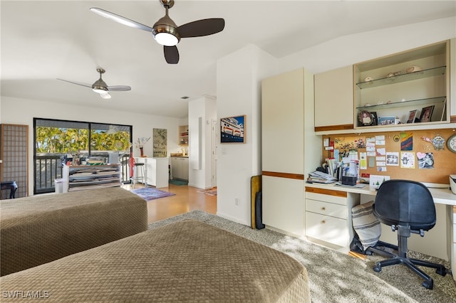 bedroom with ceiling fan and access to exterior