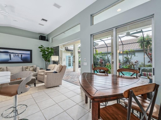 dining area featuring light tile patterned floors