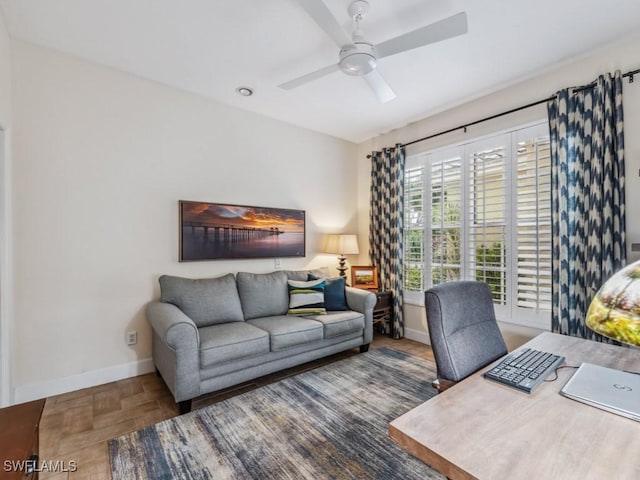 office space with parquet flooring and ceiling fan