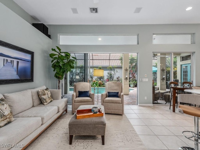 living room with light tile patterned floors